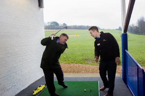 Mayor Dave Hodgson with Mowsbury Golf and Squash Centre club professional James Koncewicz at the refurbished driving range