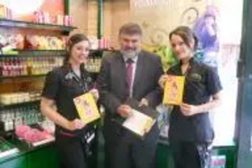 Mayor Dave Hodgson signing up to the Stop Sex Trafficking of Children Campaign in Body Shop, Bedford