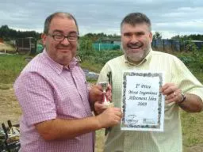 Dave Hodgson awarding a certificate at Mile Road Allotments Open Day