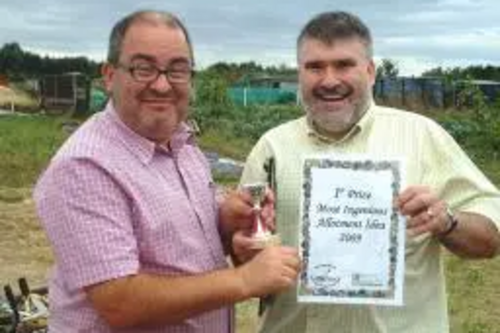 Dave Hodgson awarding a certificate at Mile Road Allotments Open Day