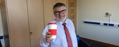 Dave Hodgson with a reusable cup