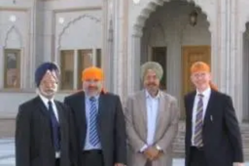 Mr Amrik Singh Jamu, Cllr Dave Hodgson, Mr Avtar Singh and Mark Fitzpatrick outside Guru Nanak Gurdwara